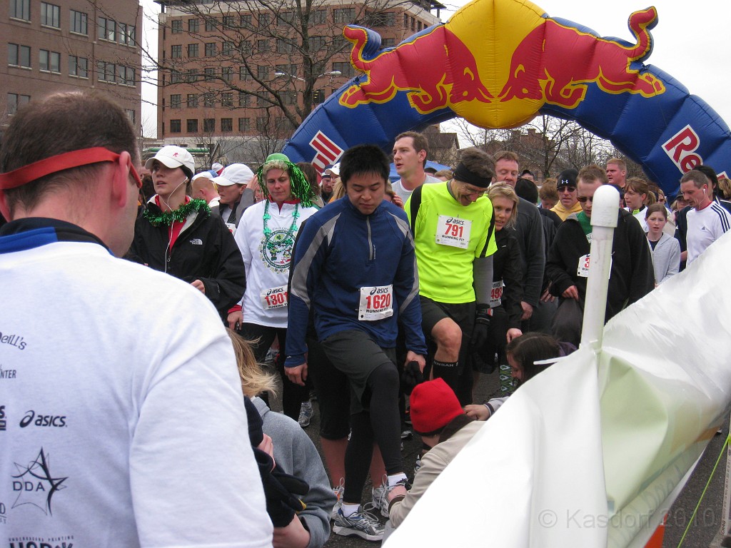 Shamrocks and Shenanigans 5K 2010 1230.jpg - The 2010 Shamrocks and Shenanigans 5K race in Ann Arbor MI. Cool and damp, and crowded. Gotta get the chip cut off the shoe.